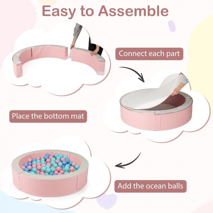 Detachable foam ball pit in pink with 50 colorful ocean balls, featuring easy assembly and a comfortable bottom mat.