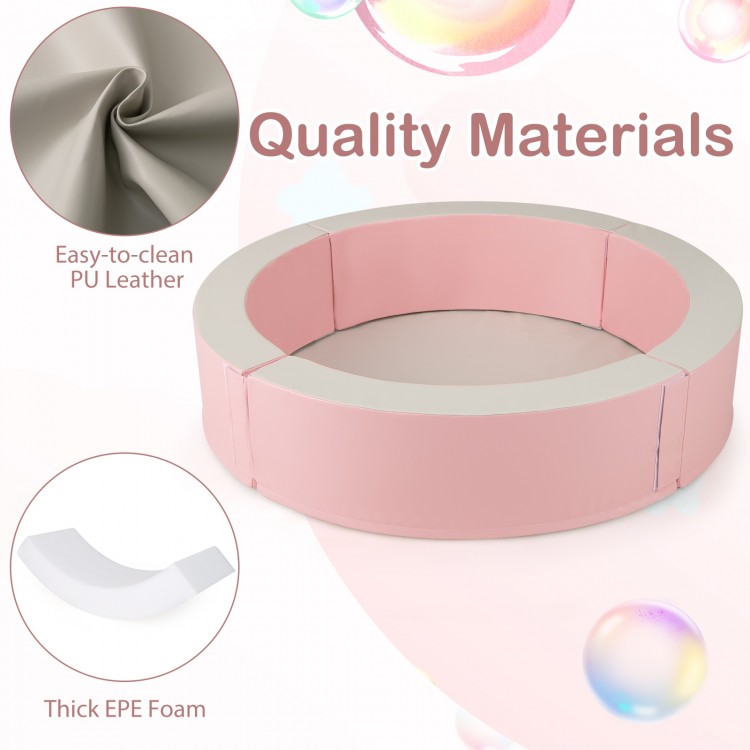 Detachable pink foam ball pit with easy-to-clean PU leather and 50 colorful ocean balls for children's playtime fun.