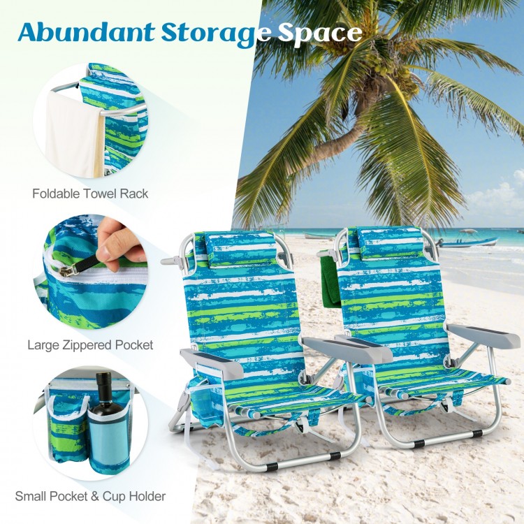 Foldable beach chairs with adjustable backrests, storage pockets, and cup holders, perfect for beach or poolside.