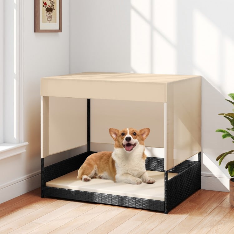 Elevated wicker dog house in black with removable cushion, suitable for small to medium breeds, for indoor or outdoor.
