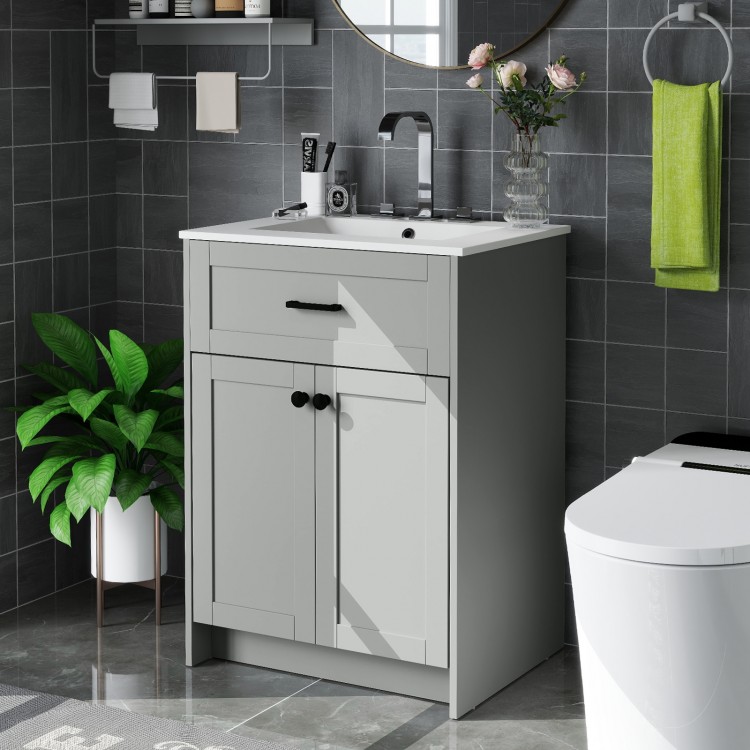 Gray bathroom vanity unit with basin, featuring two doors and sleek handles for elegant storage and easy installation.