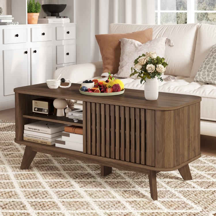 Rectangular walnut coffee table with storage, featuring adjustable shelves and a chic design, perfect for versatile use.
