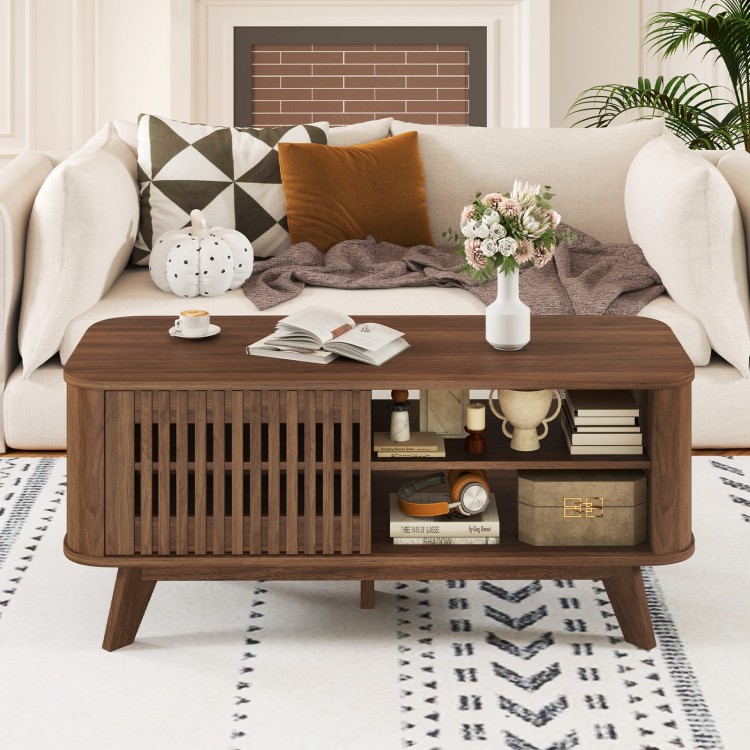 Rectangular walnut coffee table with storage, featuring double-side doors, adjustable shelves, and a chic design for.
