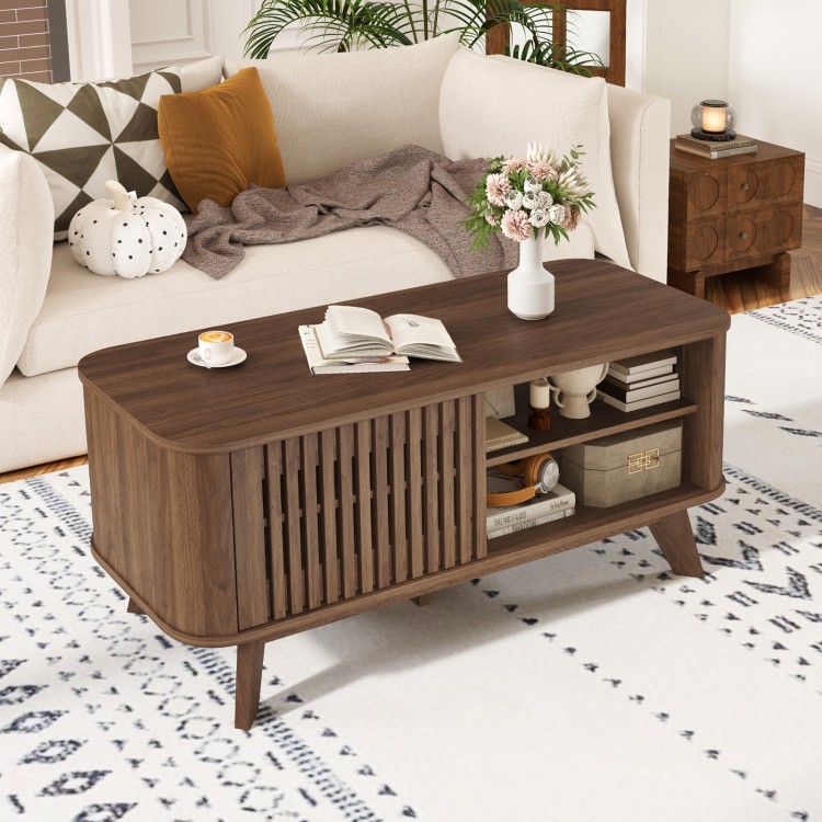 Rectangular walnut coffee table with storage, featuring adjustable shelves and a chic design for versatile use in.