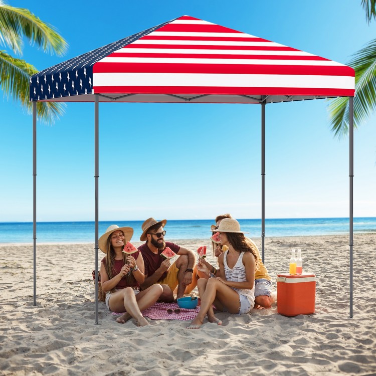Outdoor pop-up canopy tent with UPF 50+ sun protection, featuring a multicolor design, ideal for beach gatherings.