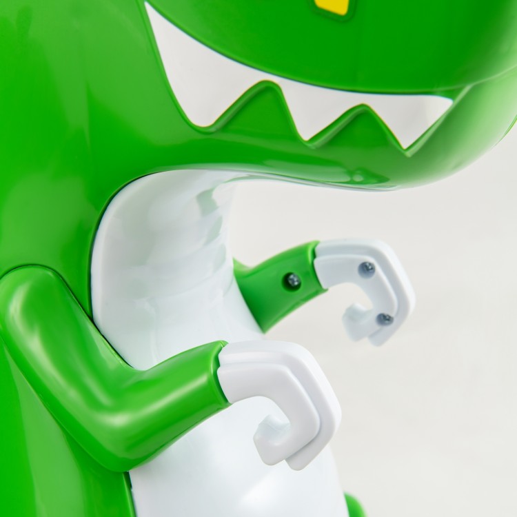 Close-up of the green dinosaur bumper car's arms, featuring a fun design for toddlers aged 2-5 with safety features.