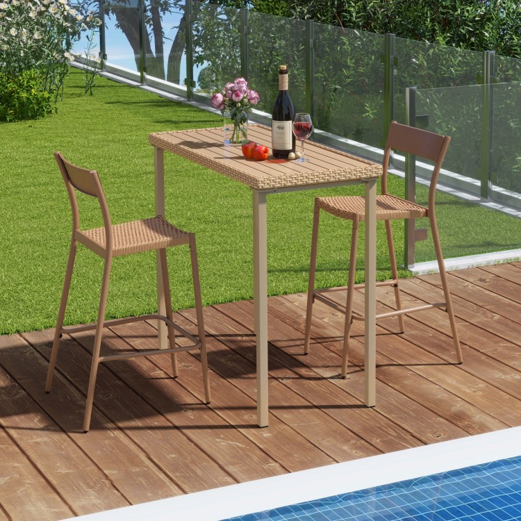 Patio bar table set with rattan seats and metal frame, perfect for outdoor dining by the poolside or patio.