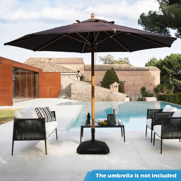 Fillable umbrella base in black with shell texture, designed for 6-10 ft patio umbrellas, providing stability and style.