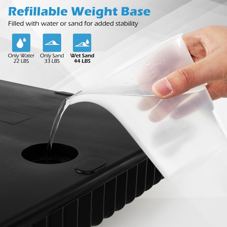 Refillable umbrella base in black, showing water being poured in for added stability, fits 6-10 ft patio umbrellas.