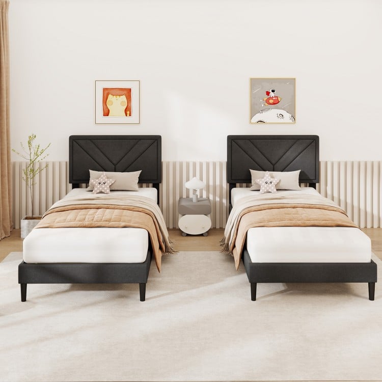 Twin size upholstered platform bed with tufted headboard, faux linen fabric, and wooden slats for stylish bedroom decor.