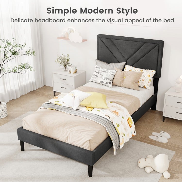 Upholstered twin platform bed with tufted headboard, faux linen fabric, and wooden slats for a modern bedroom style.