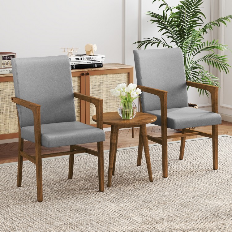 Gray upholstered accent chair featuring a solid rubber wood frame and armrests, ideal for stylish living room seating.