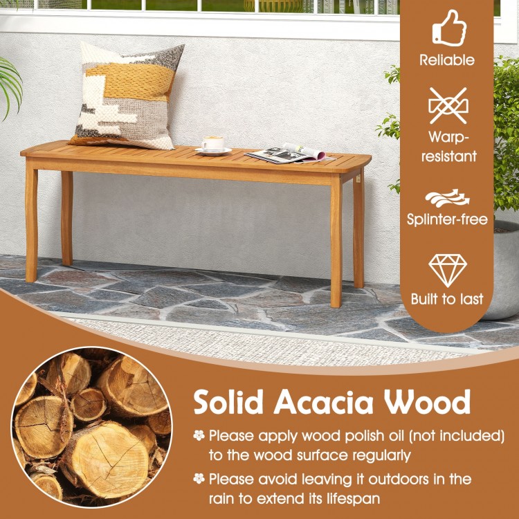 Acacia wood outdoor dining bench with slatted seat, smooth finish, and round corners, ideal for garden or entryway use.