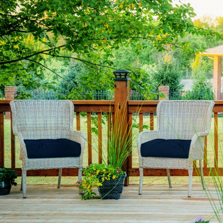 Navy 21-inch patio chair seat cushions on wicker chairs, designed for comfort and outdoor use with waterproof fabric.