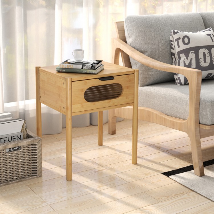 Bamboo nightstand with a decorated drawer, featuring a spacious tabletop and modern reeded glass design for elegant.