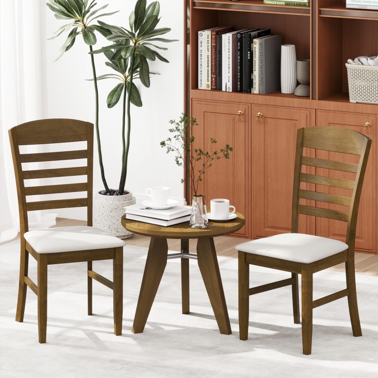 Set of 2 walnut dining chairs with rubber wood frame and padded seat, perfect for kitchen or living room use.