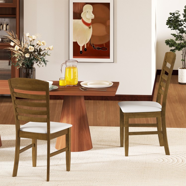 Set of 2 walnut dining chairs with rubber wood frame and padded seats, perfect for kitchen or living room use.