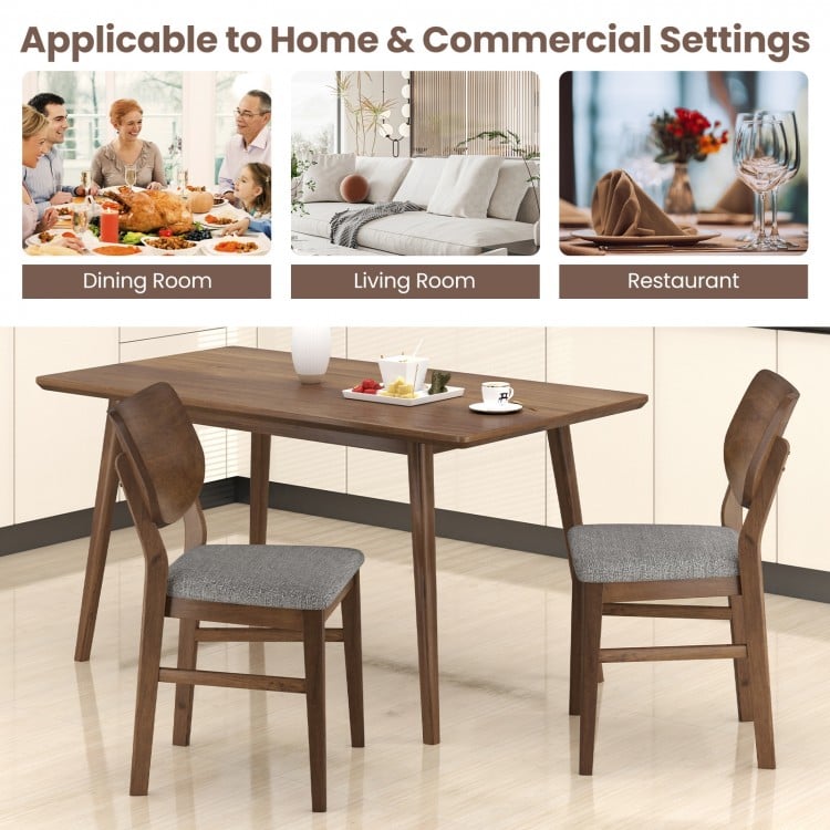 Set of 2 farmhouse upholstered kitchen chairs with rubber wood frame and gray padded seats, ideal for dining rooms.