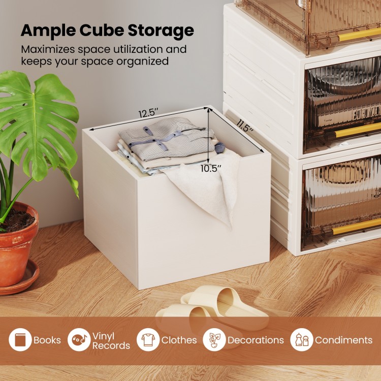 White cube storage organizer with clothes inside, designed for stackable use in living rooms or bedrooms.