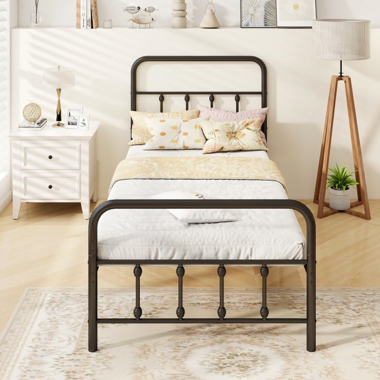 Twin size black bed frame with headboard and non-slip foot pads, offering vintage elegance and reliable support for.