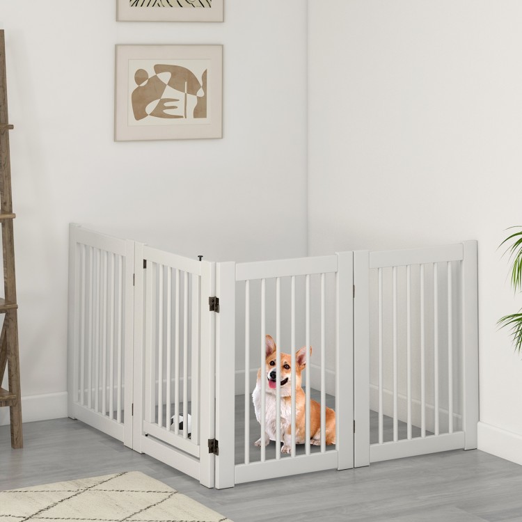Freestanding 4-panel wooden dog fence in white, 30 inches tall, providing a safe space for pets indoors.