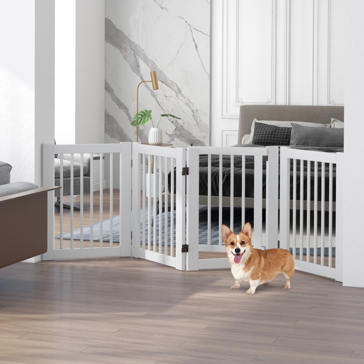 Freestanding 4-panel wooden dog fence in white, 30 inches tall, ideal for creating a safe space for pets indoors.