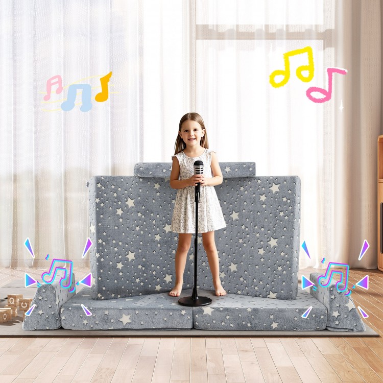 Modular kids play couch in gray with glow-in-the-dark stars, perfect for creative play and cozy lounging.