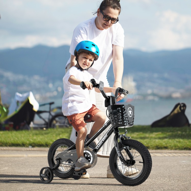 Child riding a 12-inch kids bike with basket and training wheels, featuring a sturdy metal frame and dual brake system.