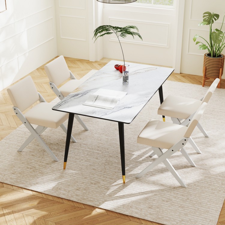White wooden dining chairs with rubber wood frames and padded cushions, perfect for modern farmhouse dining areas.