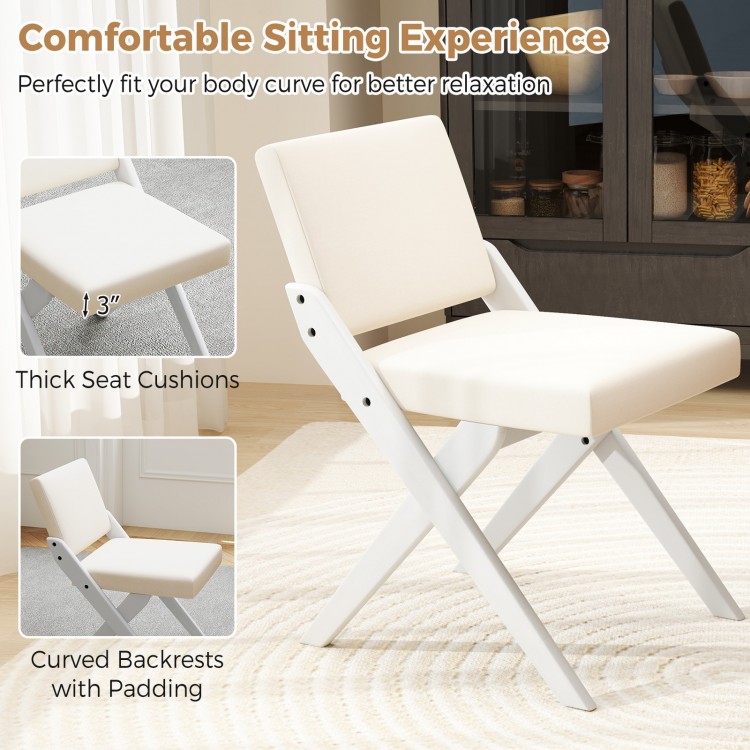 White wooden dining chair with padded cushions and curved backrest, perfect for modern farmhouse aesthetics.