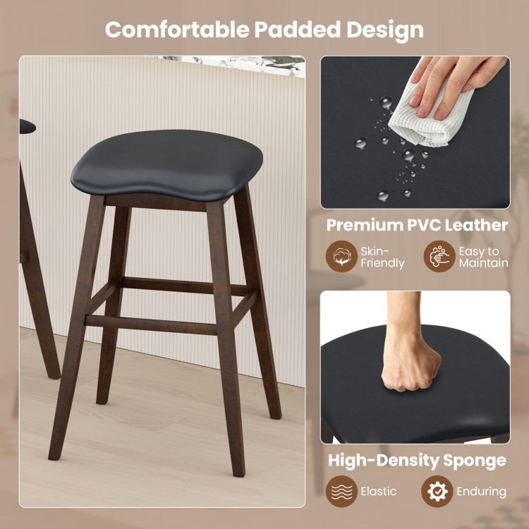 Black swivel bar stool with padded contoured seat and rubber wood legs, perfect for kitchens and dining rooms.