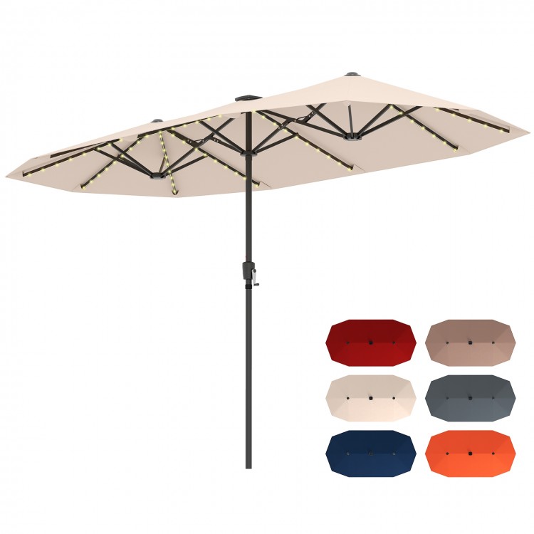 Close-up of the 13 ft beige patio umbrella's solar panel and protective rib pockets, designed for durability and energy.