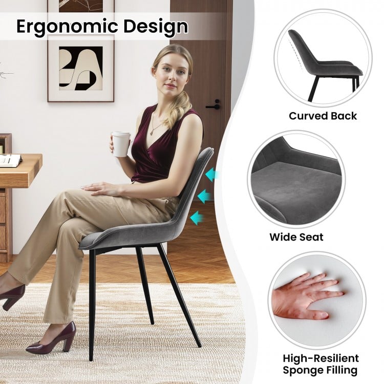 Gray dining chair with ergonomic curved back and wide seat, featuring PU leather upholstery and metal legs for modern.