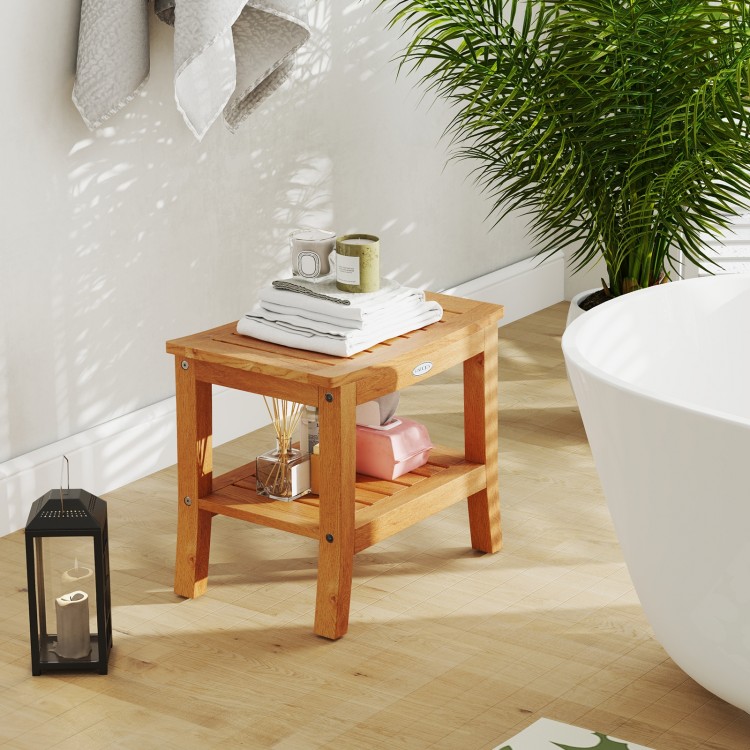 20-inch non-slip shower bench with a curved top, solid teak construction, and two-tier storage shelf for towels.