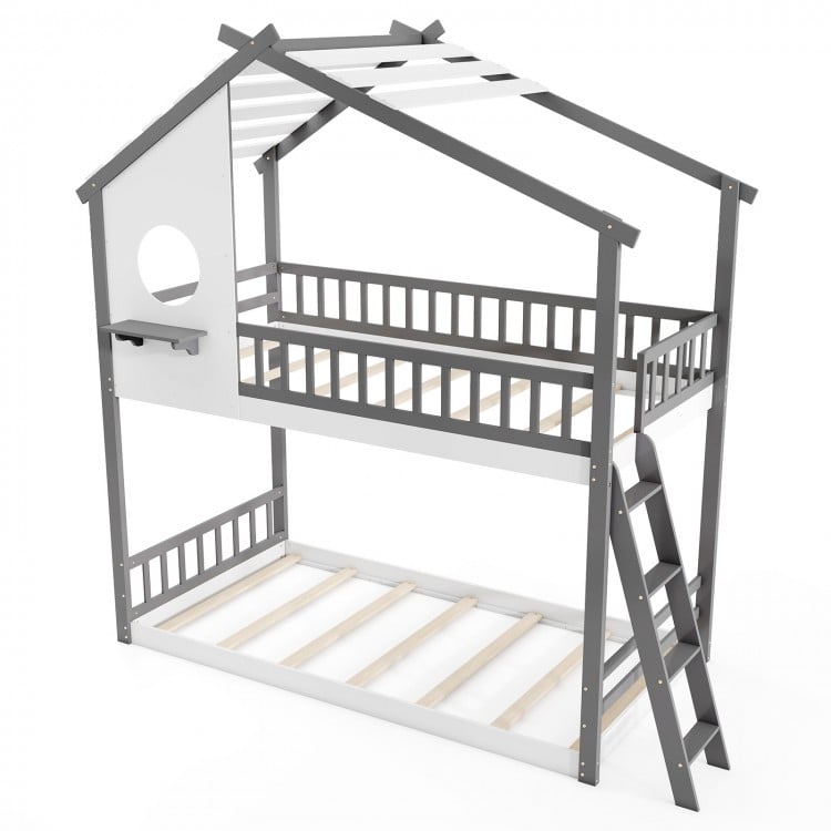 Twin over twin house bunk bed in white and gray with roof, guardrails, and integrated ladder for kids' safety.