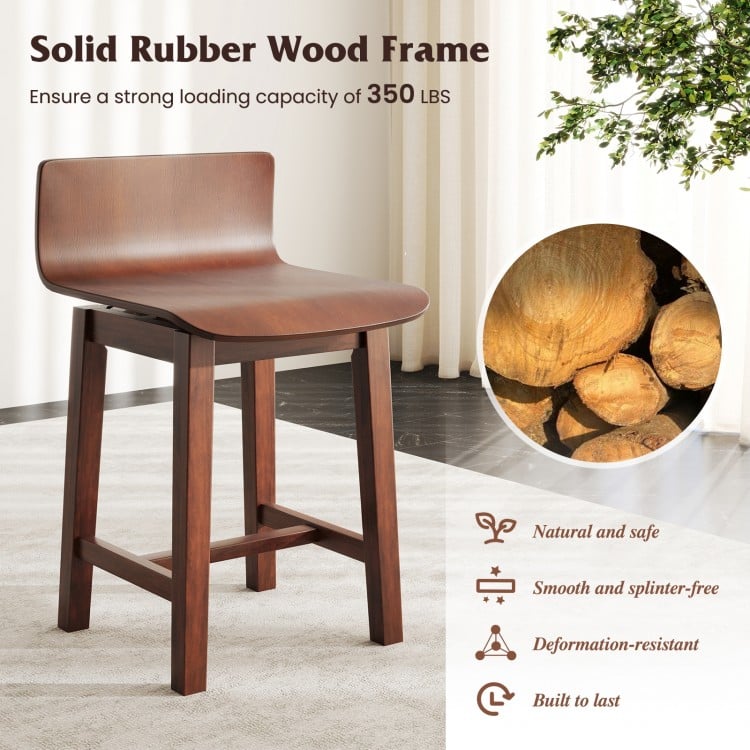 Swivel dining chair with low back and curved seat in walnut, featuring a solid rubber wood frame for stability and.