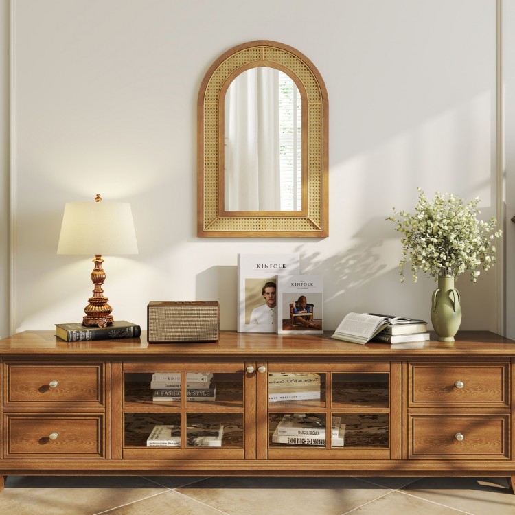 Rattan wall-mounted decorative mirror with a sturdy wooden frame, ideal for entryway or living room decor.