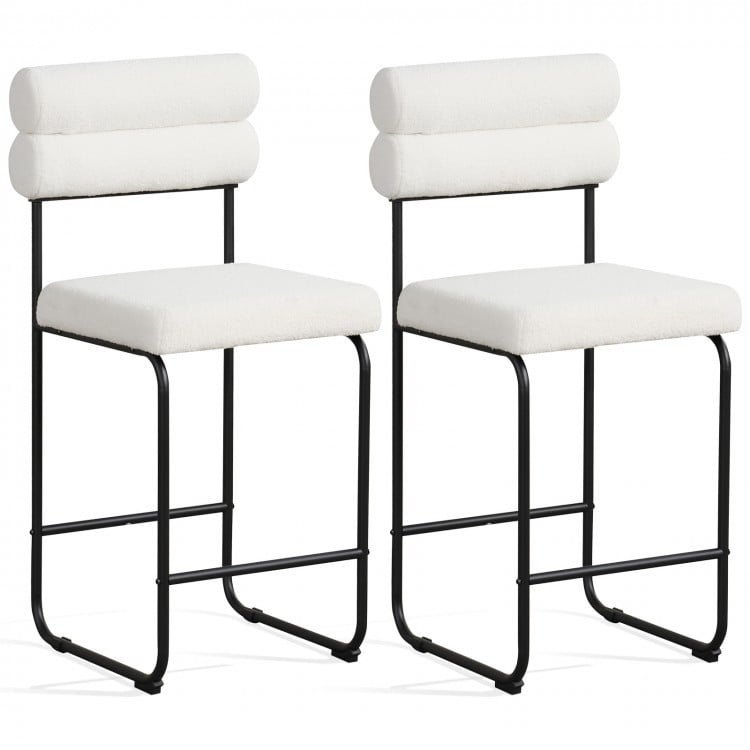 Set of 2 white counter height bar stools with metal frame, plush teddy fabric, and ergonomic footrest for kitchen use.