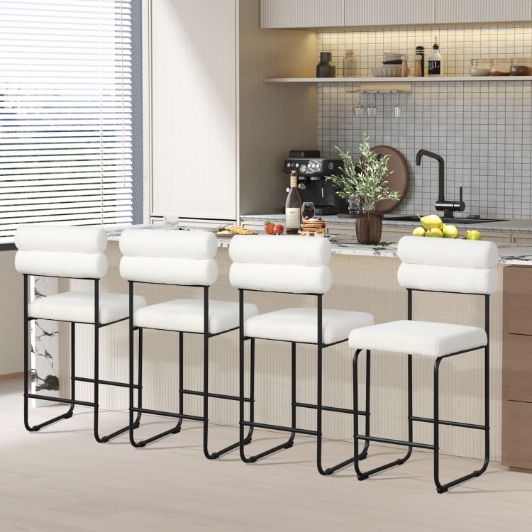Set of 2 white counter height bar stools with metal frame, ergonomic backrest, and footrest for kitchen or dining use.