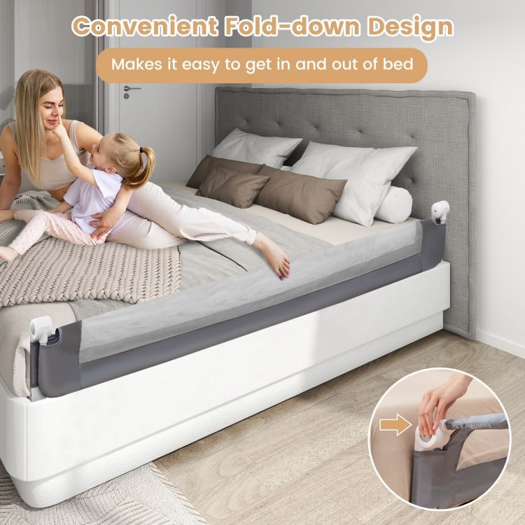 Foldable 71-inch baby bed guard rail in gray with adjustable strap, providing safety and easy access for toddlers.