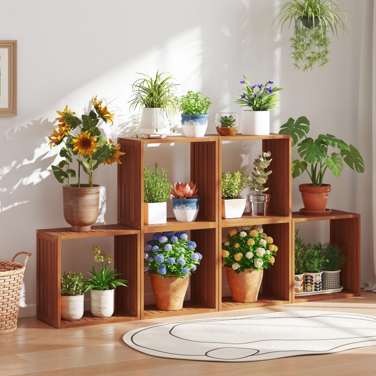 Solid wood 3 cube bookcase with open slatted design, showcasing plants and flowers, ideal for indoor or outdoor use.