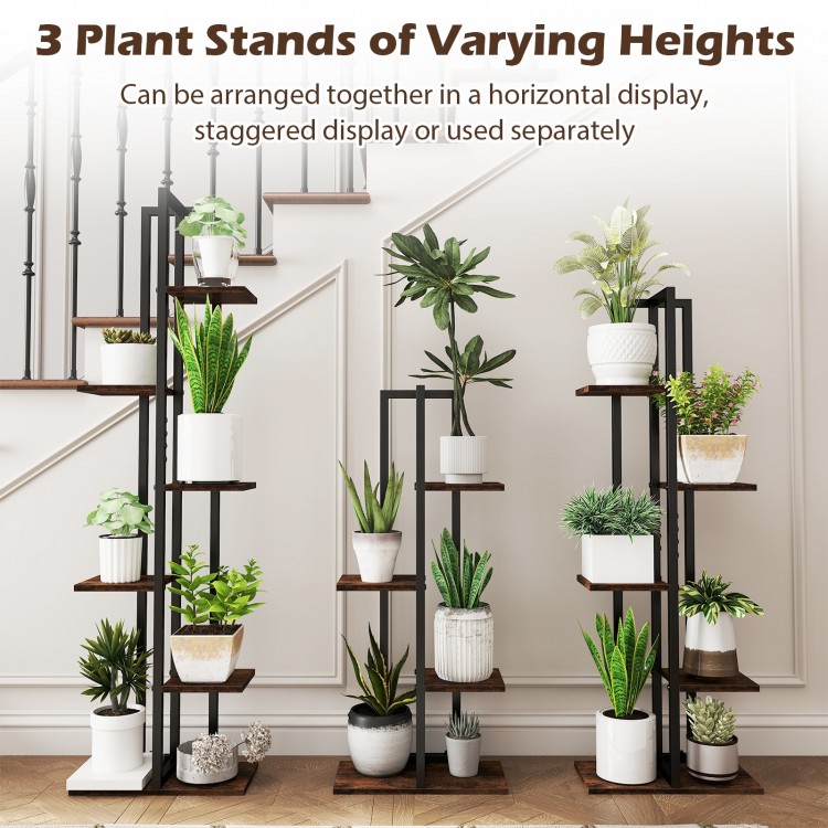 Three tall wood plant stands in rustic brown, featuring staggered heights for optimal sunlight and stylish display.