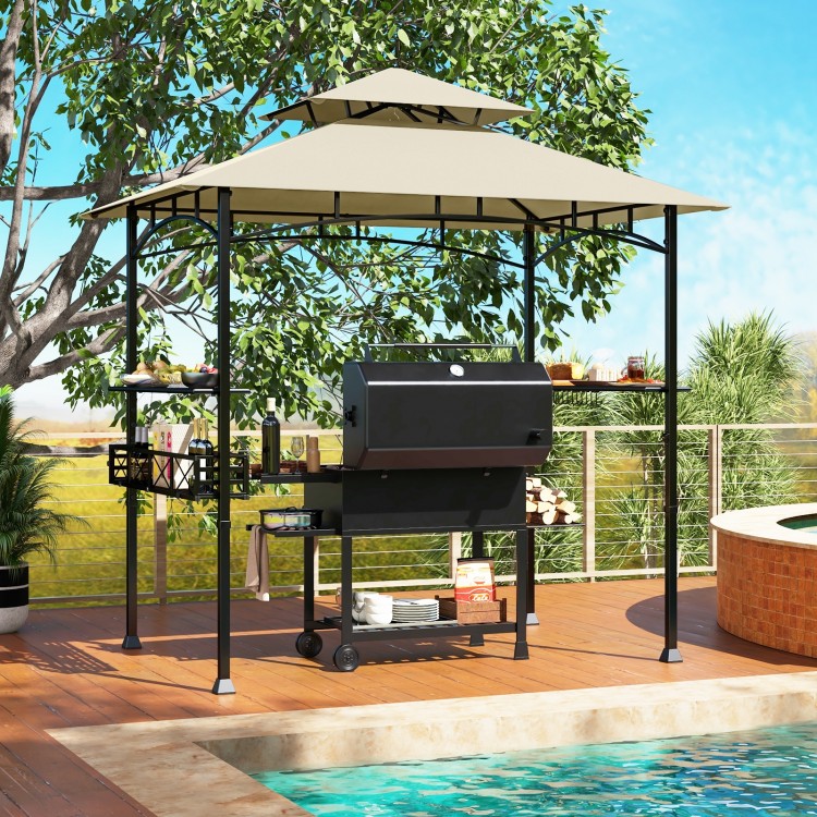 Outdoor grill gazebo with beige 2-tier canopy, side shelves, and hooks for tools, perfect for backyard barbecues.