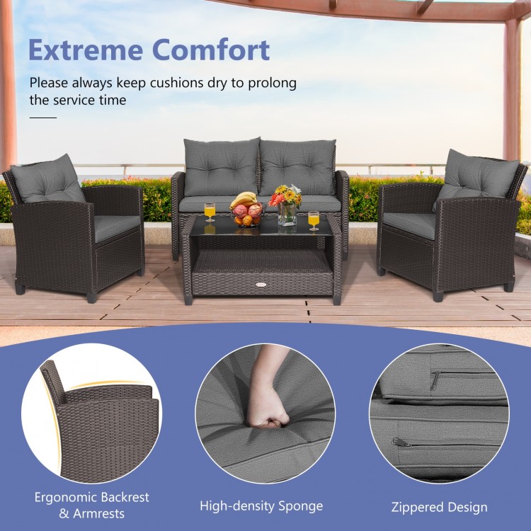 4-piece gray patio rattan furniture set featuring a coffee table, loveseat, and two single sofas for outdoor relaxation.