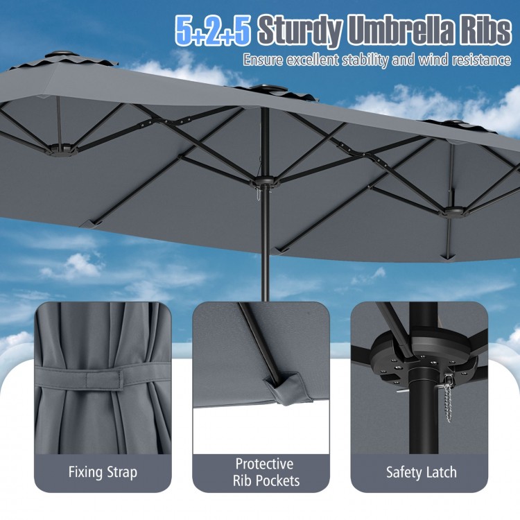 Close-up of the 15.5 ft gray patio umbrella's sturdy ribs and protective pockets, designed for stability and wind.