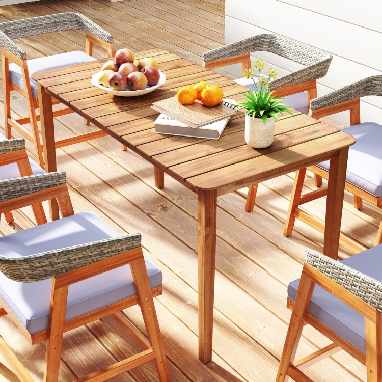 Acacia wood rectangular outdoor dining table set with six chairs, perfect for gatherings and easy maintenance with.