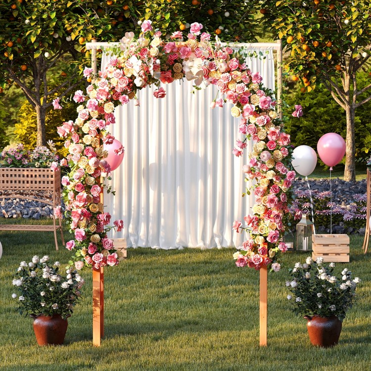 Wooden garden arch with floral decorations, ideal for climbing plants, weddings, or patio entryways.