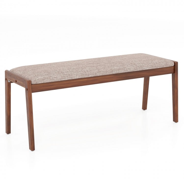 Backless 45-inch farmhouse bench with rubber wood legs and beige padded seat, ideal for dining or entryway use.