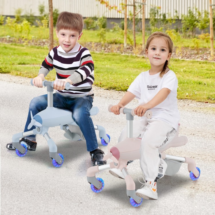 Kids riding on the 2-in-1 push car with LED lighted wheels in pink, featuring adjustable handle and storage basket.