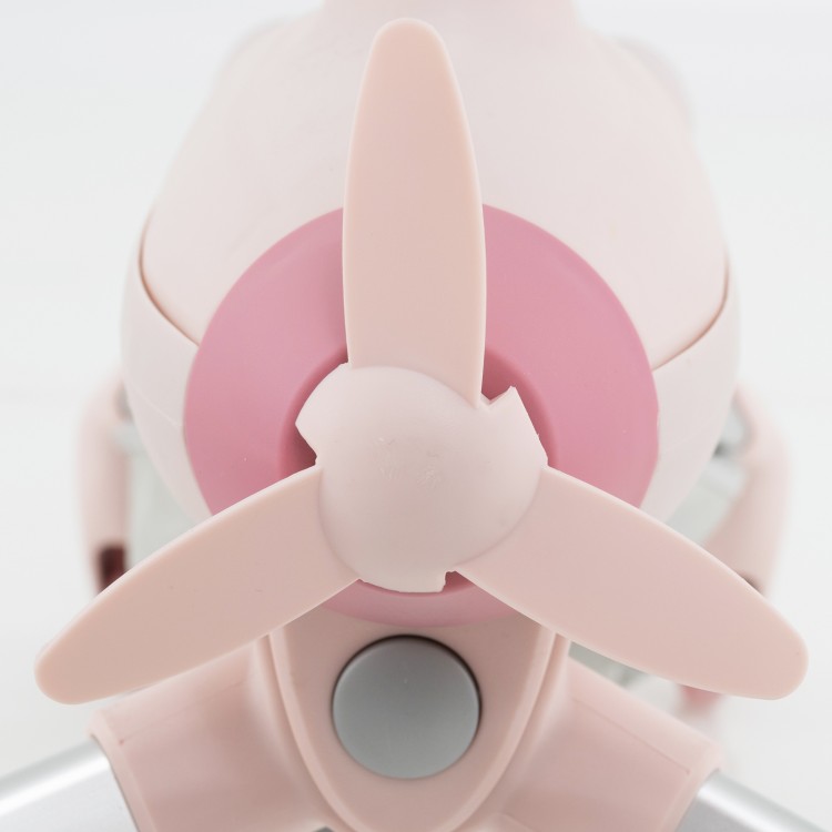 Close-up of the pink propeller on the 2-in-1 kids ride-on push car with LED lighted wheels for outdoor fun.